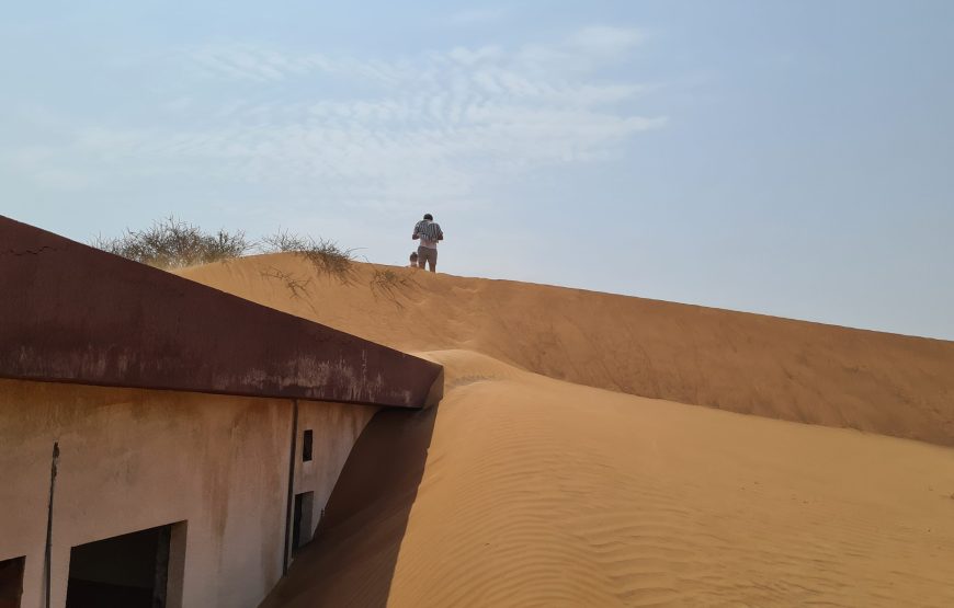 Private Ghost Village Safari Tour with Dune Bashing and Sandboarding